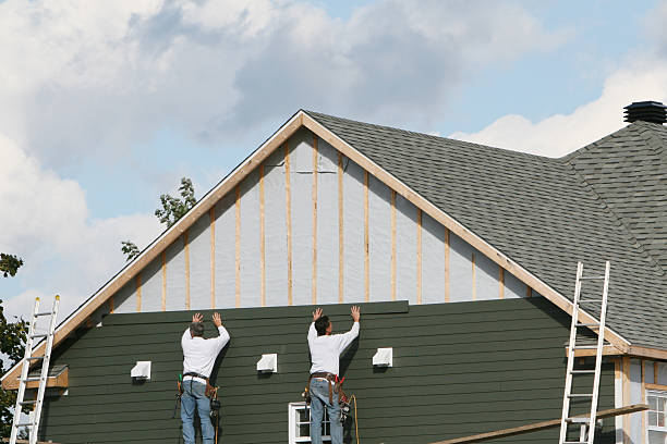 Professional Siding Repair technician working in Medford, NY